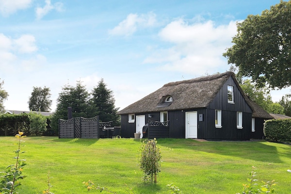 Foto van Charmant huisje vlakbij het bos in Farsø - Vakantiehuis in Farsø - Outdoor