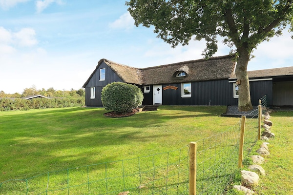 Foto van Charmant huisje vlakbij het bos in Farsø - Vakantiehuis in Farsø - Outdoor
