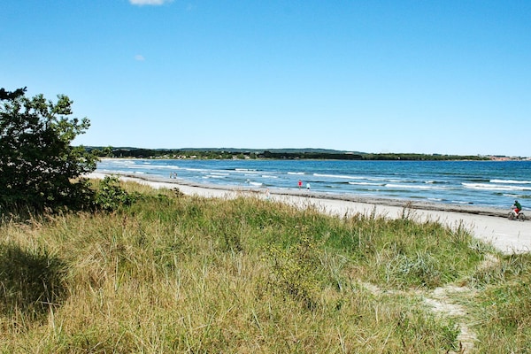 Foto van Toevluchtsoord aan het strand met dennenbomen - Vakantiehuis in Nexø - View