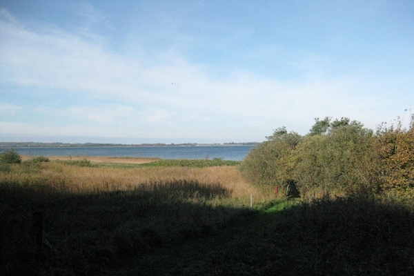 Foto van Rustieke kustretreat -- By Traum Ferienwohnungen - Vakantiehuis in Roslev - WaterView