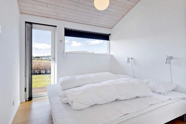 Foto van Vakantiehuis aan de kust met spa en sauna - Vakantiehuis in Rudkøbing - WaterView