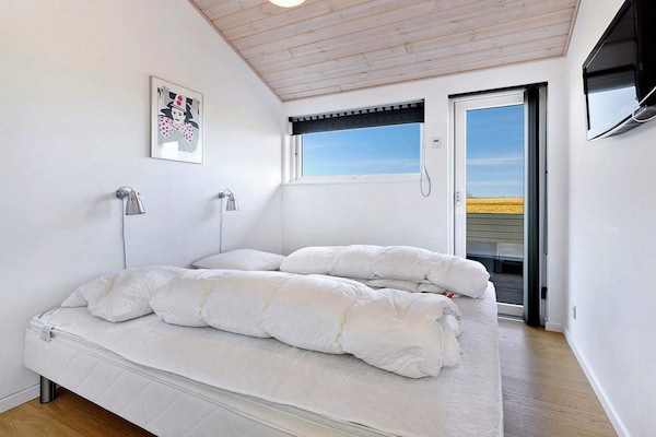 Foto van Vakantiehuis aan de kust met spa en sauna - Vakantiehuis in Rudkøbing - WaterView