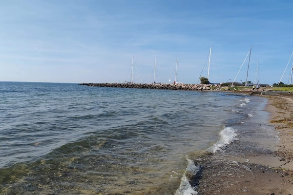 Foto van Luxe strandretraite in Væggerløse - Vakantiehuis in Væggerløse - WaterView