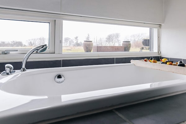 Foto van Zonnig vakantiehuisje met spafaciliteiten - Vakantiehuis in Gedser - Spa