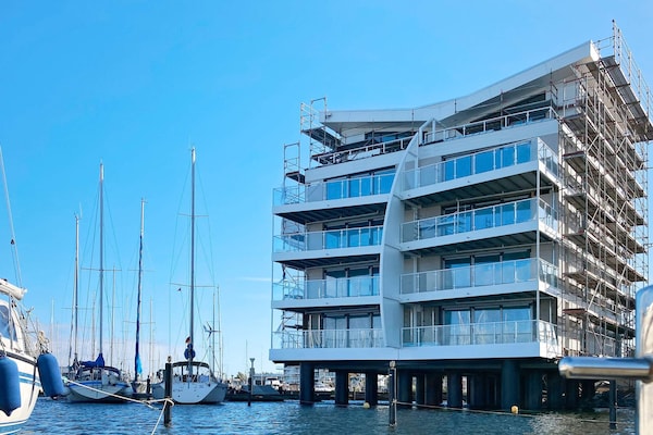 Foto van Villa aan het water op een locatie in de haven - Vakantiehuis in Wendtorf - Outdoor