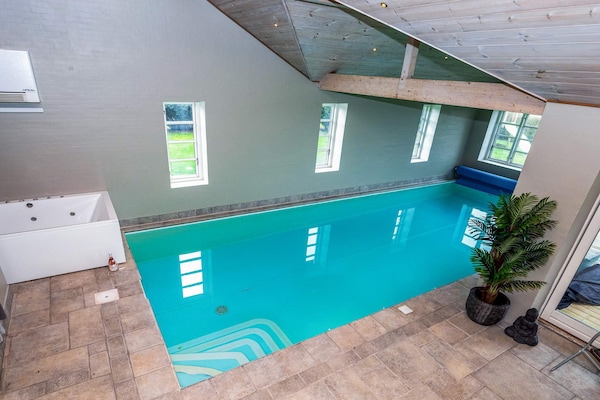 Foto van Lodge met uitzicht op de Limfjord - Vakantiehuis in Spøttrup - Pool