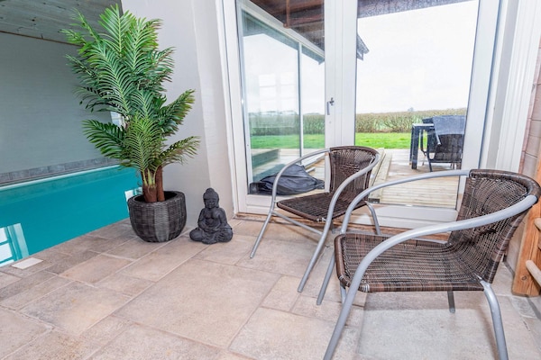Foto van Lodge met uitzicht op de Limfjord - Vakantiehuis in Spøttrup - Pool