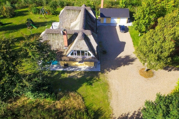 Foto van Luxe bos retraite -- By Traum Ferienwohnungen - Vakantiehuis in Karup J - Outdoor