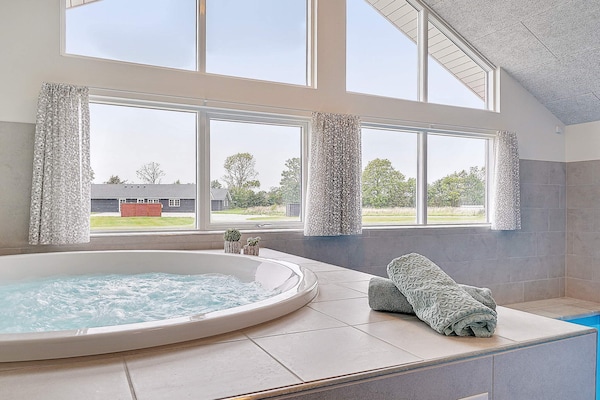 Foto van Luxe vakantieverblijf met zwembad - Vakantiehuis in Grenaa - Spa