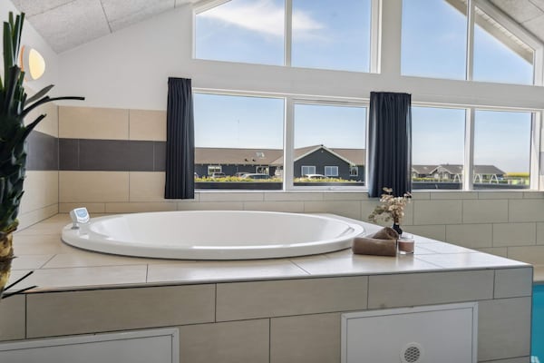 Foto van Luxe strandhuis met zwembad - Vakantiehuis in Bogense - Spa