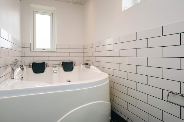 Foto van Luxe vakantiehuis met uitzicht op de golfbaan - Vakantiehuis in Rømø - Spa