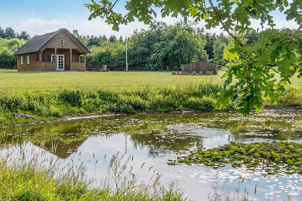Foto van Luxe verblijf met jacuzzi - Vakantiehuis in Gram - WaterView