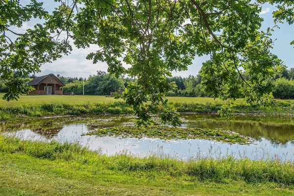 Foto van Luxe verblijf met jacuzzi - Vakantiehuis in Gram - WaterView