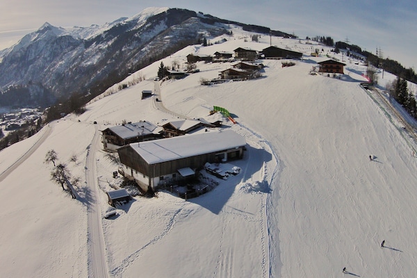 Foto van Vakantieappartement Imbachhorn – direct aan de skipiste - ExteriorWinter