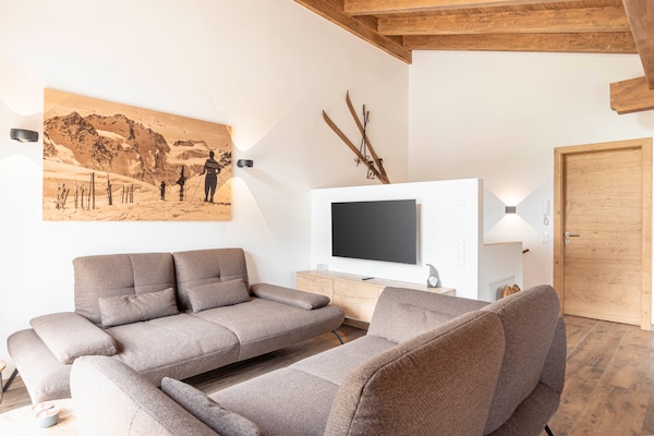 Foto van Luxe chalet met sauna bij het zwemmeer - Vakantiehuis in Uttendorf - LivingRoom