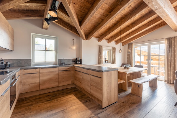 Foto van Luxe chalet met sauna bij het zwemmeer - Vakantiehuis in Uttendorf - Kitchen