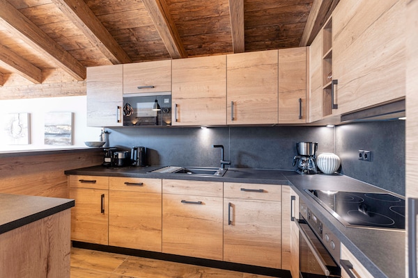 Foto van Luxe chalet met sauna bij het zwemmeer - Vakantiehuis in Uttendorf - Kitchen