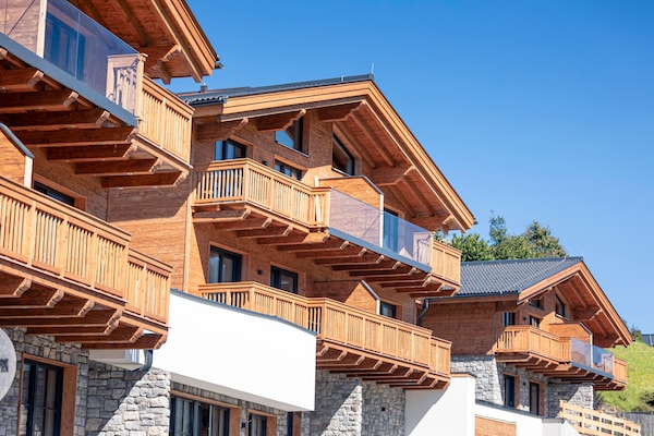 Foto van Luxe chalet met sauna bij het zwemmeer - Vakantiehuis in Uttendorf - ExteriorSummer