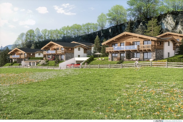 Foto van Luxe chalet met sauna bij het zwemmeer - Vakantiehuis in Uttendorf - ExteriorSummer