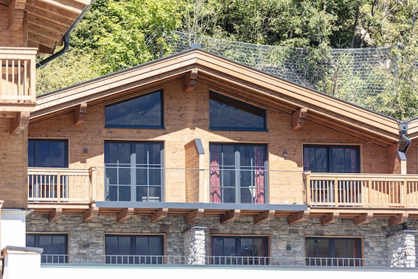 Foto van Luxe chalet met sauna bij het zwemmeer - Vakantiehuis in Uttendorf - ExteriorSummer