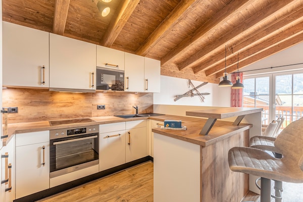 Foto van Luxe chalet met sauna bij het zwemmeer - Vakantiehuis in Uttendorf - Kitchen