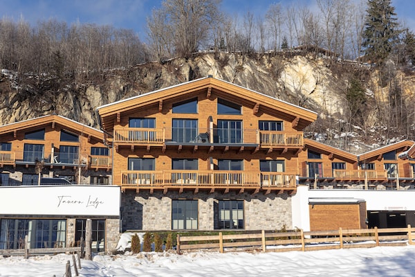 Foto van Luxe chalet met sauna bij het zwemmeer - Vakantiehuis in Uttendorf - ExteriorWinter