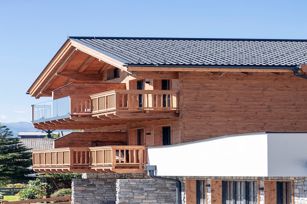 Foto van Luxe chalet met prive sauna, nabij een zwemmeer - Vakantiehuis in Uttendorf - ExteriorSummer