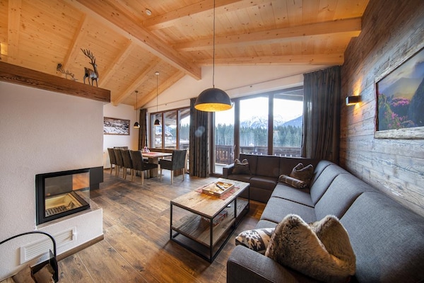 Foto van Alpenchalet met sauna en balkon - Vakantiehuis in Neukirchen - LivingRoom