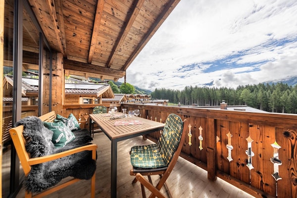 Foto van Alpenchalet met sauna en balkon - Vakantiehuis in Neukirchen - TerraceBalcony