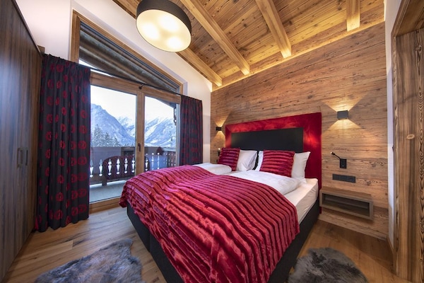 Foto van Chalet Retreat nabij de Kitzbüheler Alpen - Vakantiehuis in Neukirchen - BedRoom