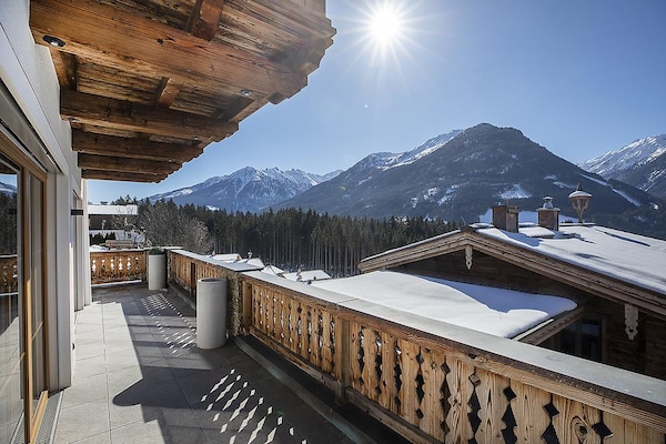 Foto van Chalet met sauna en natuurzwembad - Vakantiehuis in Neukirchen - ViewWinter
