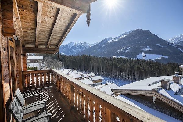 Foto van Chalet met sauna en natuurzwembad - Vakantiehuis in Neukirchen - ViewWinter