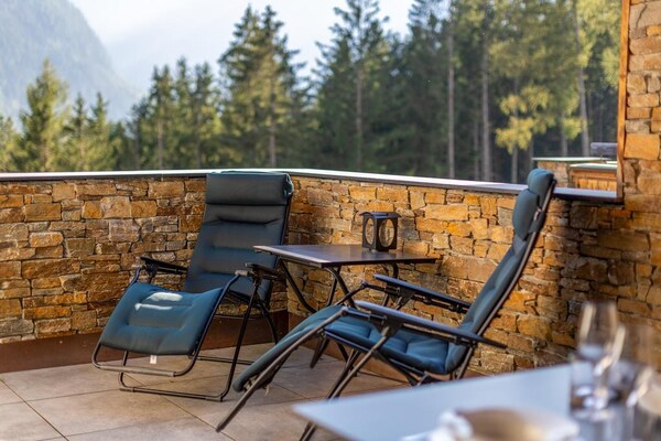Foto van Chalet in Neukirchen met sauna en balkon - Vakantiehuis in Neukirchen - TerraceBalcony