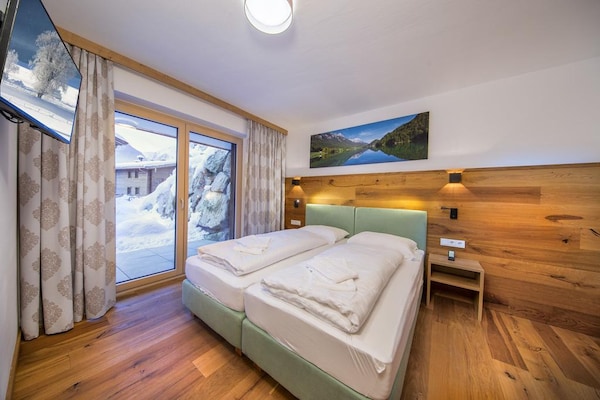 Foto van Chalet met sauna vlakbij de skibus - Vakantiehuis in Neukirchen - BedRoom