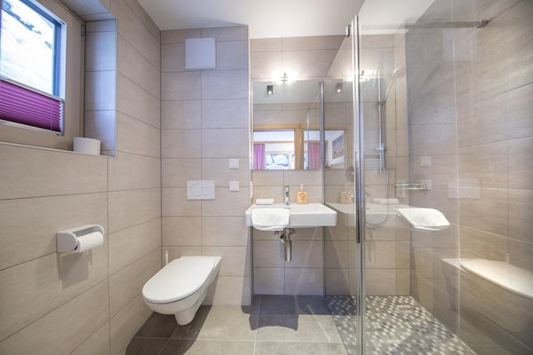Foto van Chalet met sauna vlakbij de skibus - Vakantiehuis in Neukirchen - BathRoom