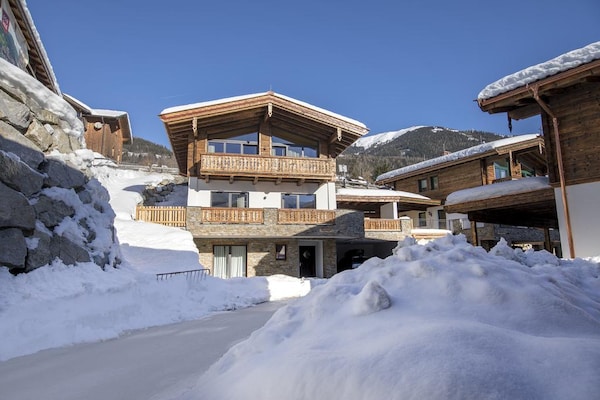 Foto van Chalet met sauna vlakbij de skibus - Vakantiehuis in Neukirchen - ExteriorWinter
