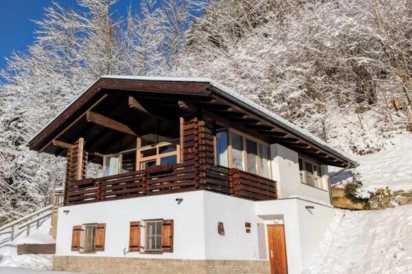 Foto van Vrijstaande alpenchalet met sauna - Vakantiehuis in Wald-Königsleiten - ExteriorWinter