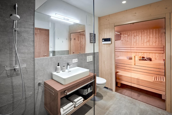 Foto van Chalet in Alpen bij Skilift & Piste - Vakantiehuis in Sankt Ulrich am Pillersee - BathRoom