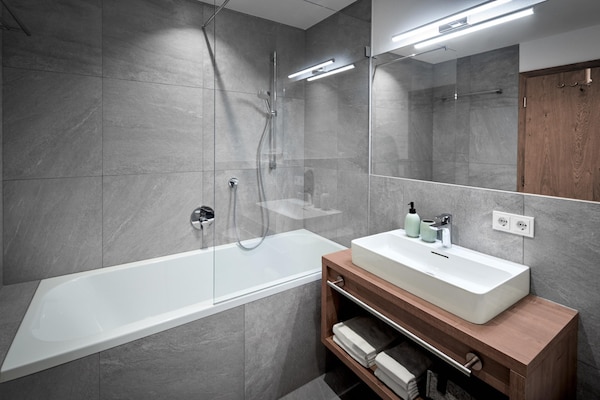 Foto van Chalet in Alpen bij Skilift & Piste - Vakantiehuis in Sankt Ulrich am Pillersee - BathRoom