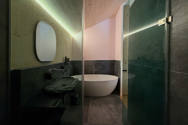 Foto van Luxe chalet met sauna en bubbelbad - Vakantiehuis in Turrach - BathRoom