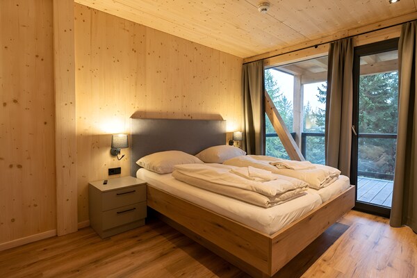 Foto van Luxe chalet met sauna en bubbelbad. - Vakantiehuis in Turrach - BedRoom