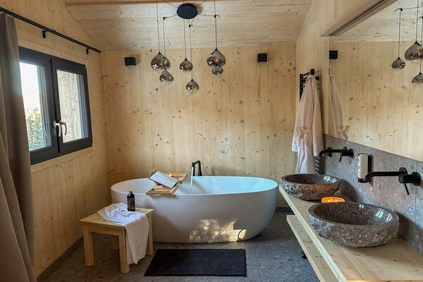 Foto van Luxe chalet met sauna en bubbelbad. - Vakantiehuis in Turrach - BathRoom