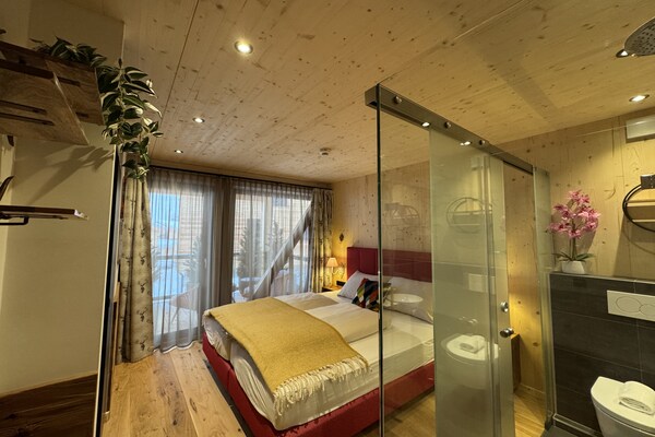 Foto van Luxe chalet met sauna en bubbelbad. - Vakantiehuis in Turrach - BedRoom