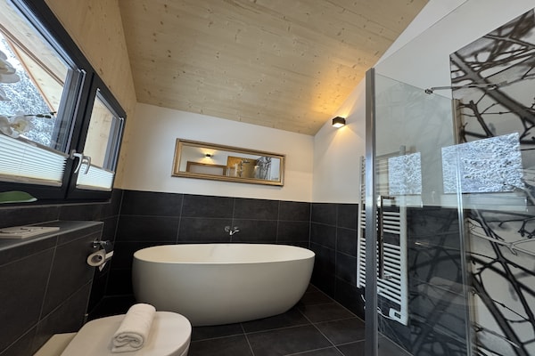 Foto van Luxe chalet met sauna en bubbelbad. - Vakantiehuis in Turrach - BathRoom