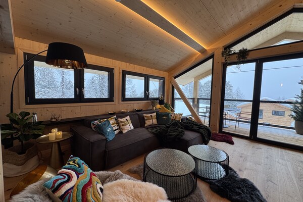 Foto van Luxe chalet met sauna en bubbelbad. - Vakantiehuis in Turrach - LivingRoom