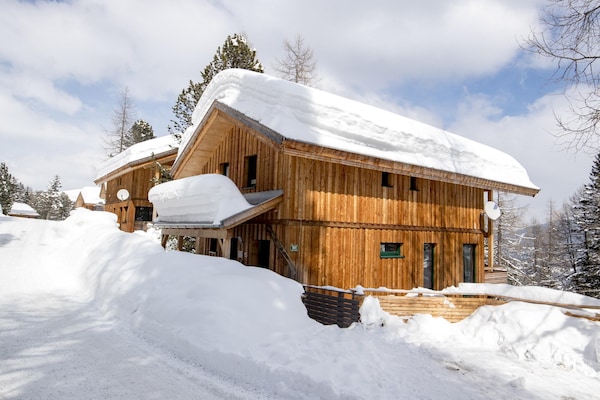 Foto van Luxe chalet met buitenwhirlpool - Vakantiehuis in Turracherhöhe - ExteriorWinter