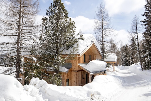 Foto van Luxe chalet met buitenwhirlpool - Vakantiehuis in Turracherhöhe - ExteriorWinter