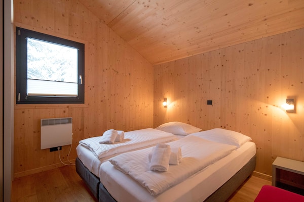 Foto van Luxe chalet met buitenwhirlpool - Vakantiehuis in Turracherhöhe - BedRoom