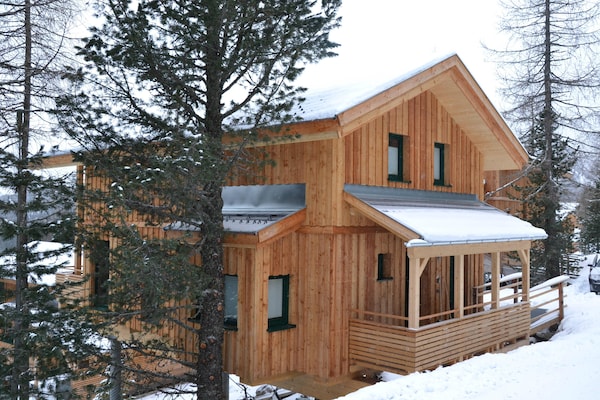 Foto van Luxe chalet met buitenwhirlpool - Vakantiehuis in Turracherhöhe - ExteriorWinter