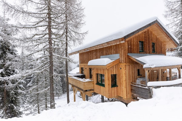 Foto van Luxe chalet met buitenwhirlpool - Vakantiehuis in Turracherhöhe - ExteriorWinter